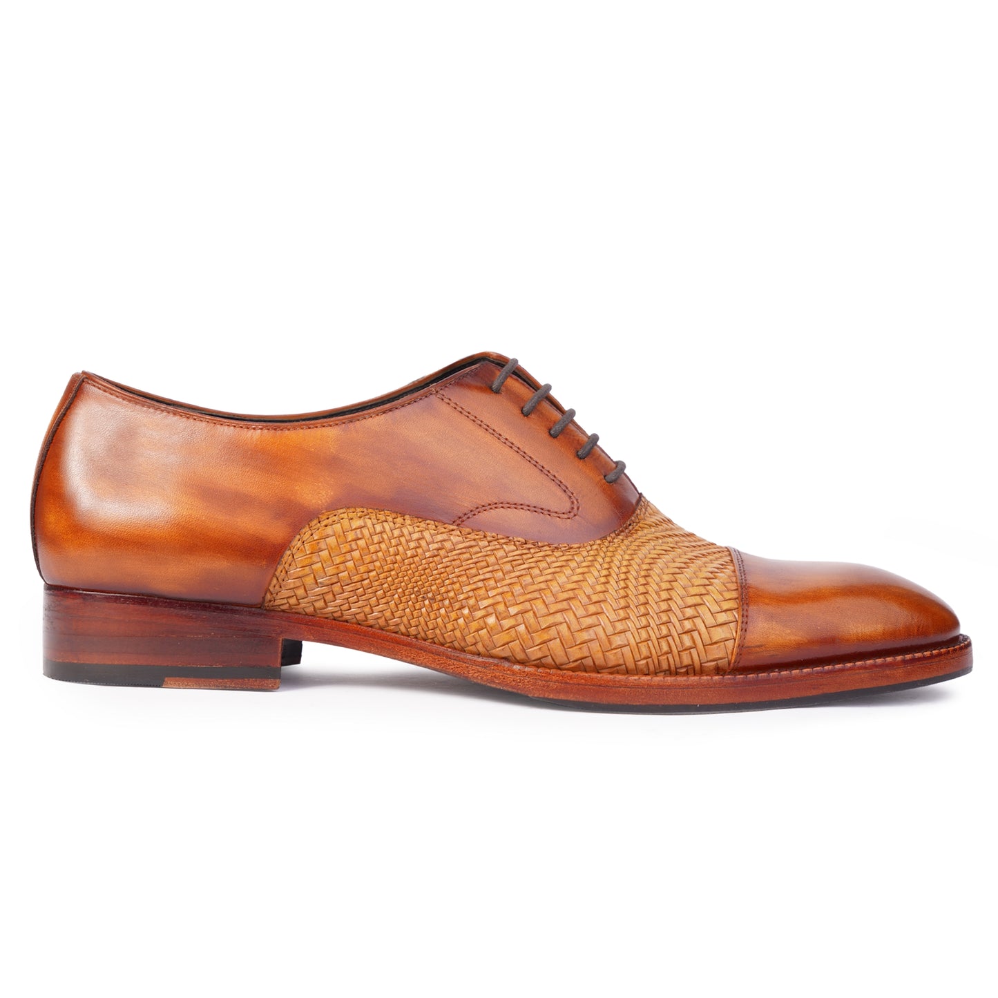 Side view of Two tone Spectators in Brown colour Captoe formal shoes in leather with Blake stitched leather sole
