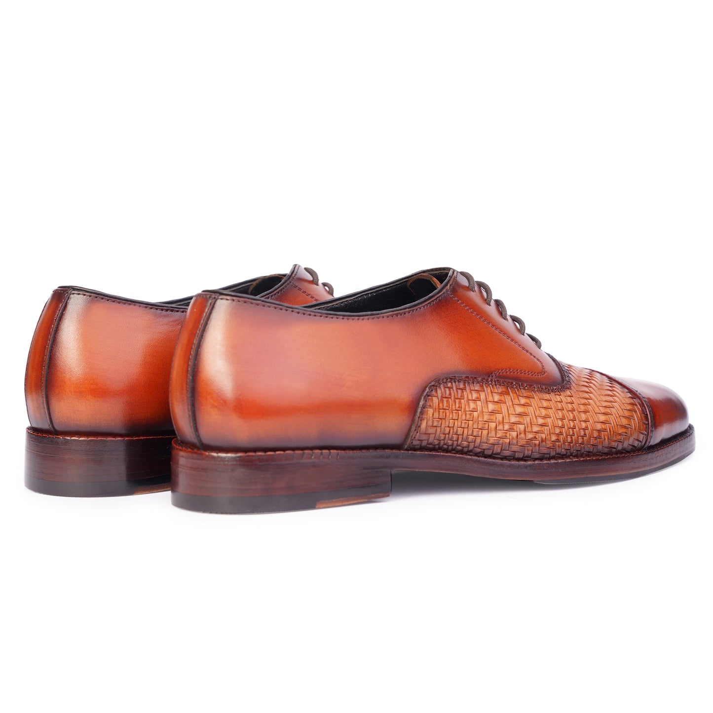 Side angle view of Two tone Spectators in Reddish Brown colour Captoe formal shoes in leather with Blake stitched leather sole
