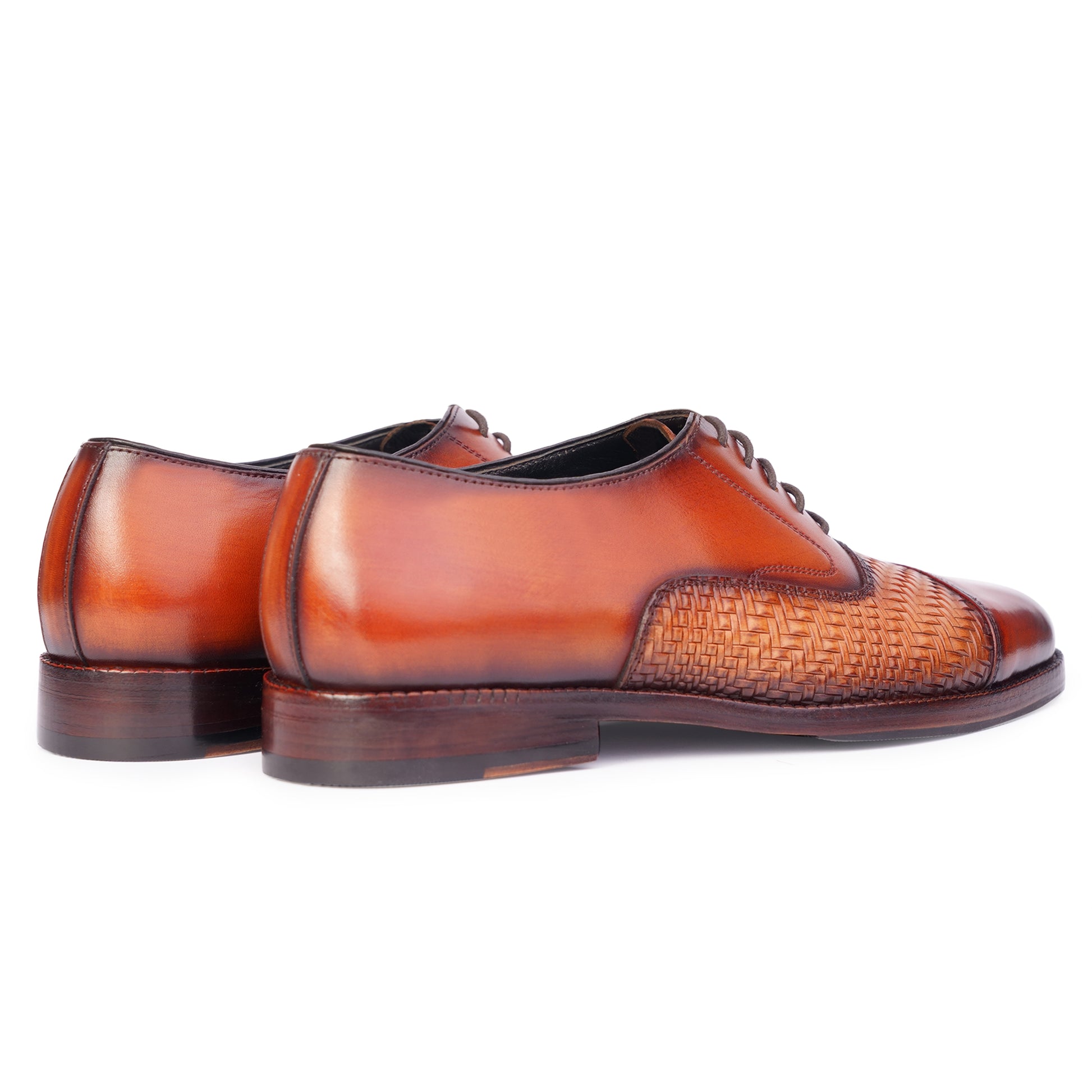Side angle view of Two tone Spectators in Reddish Brown colour Captoe formal shoes in leather with Blake stitched leather sole
