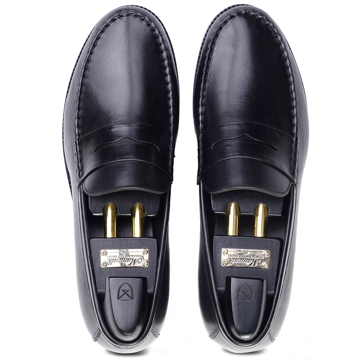 Top view Black colour Penny loafer formal shoes in leather with Blake stitched leather sole
