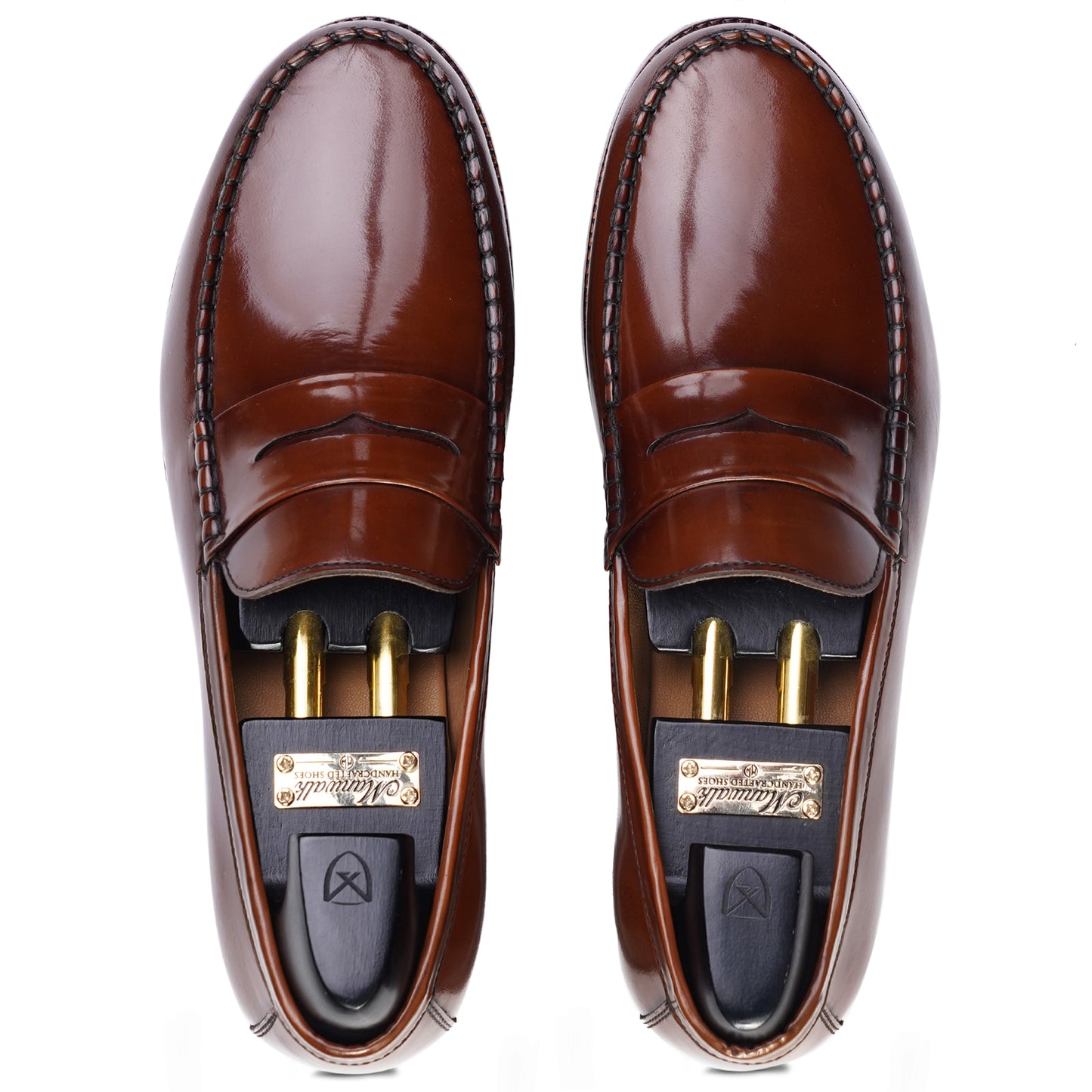 Top view of Brown colour Round toe Penny loafer formal shoes in leather with Blake stitched leather sole
