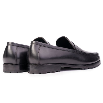 Back and side view of Loafers Round toe in Black colour hand painted full grain patina leather with Blake stitched sole