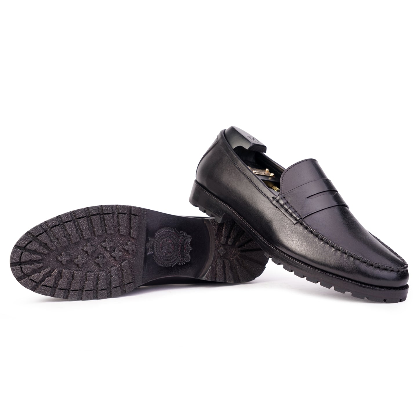 Outsole view Black colour Penny loafer formal shoes in leather with Blake stitched leather sole
