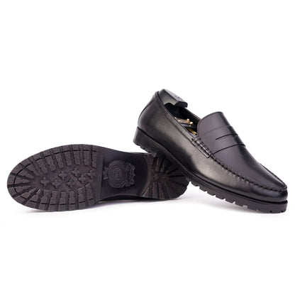 Outsole view Black colour Penny loafer formal shoes in leather with Blake stitched leather sole
