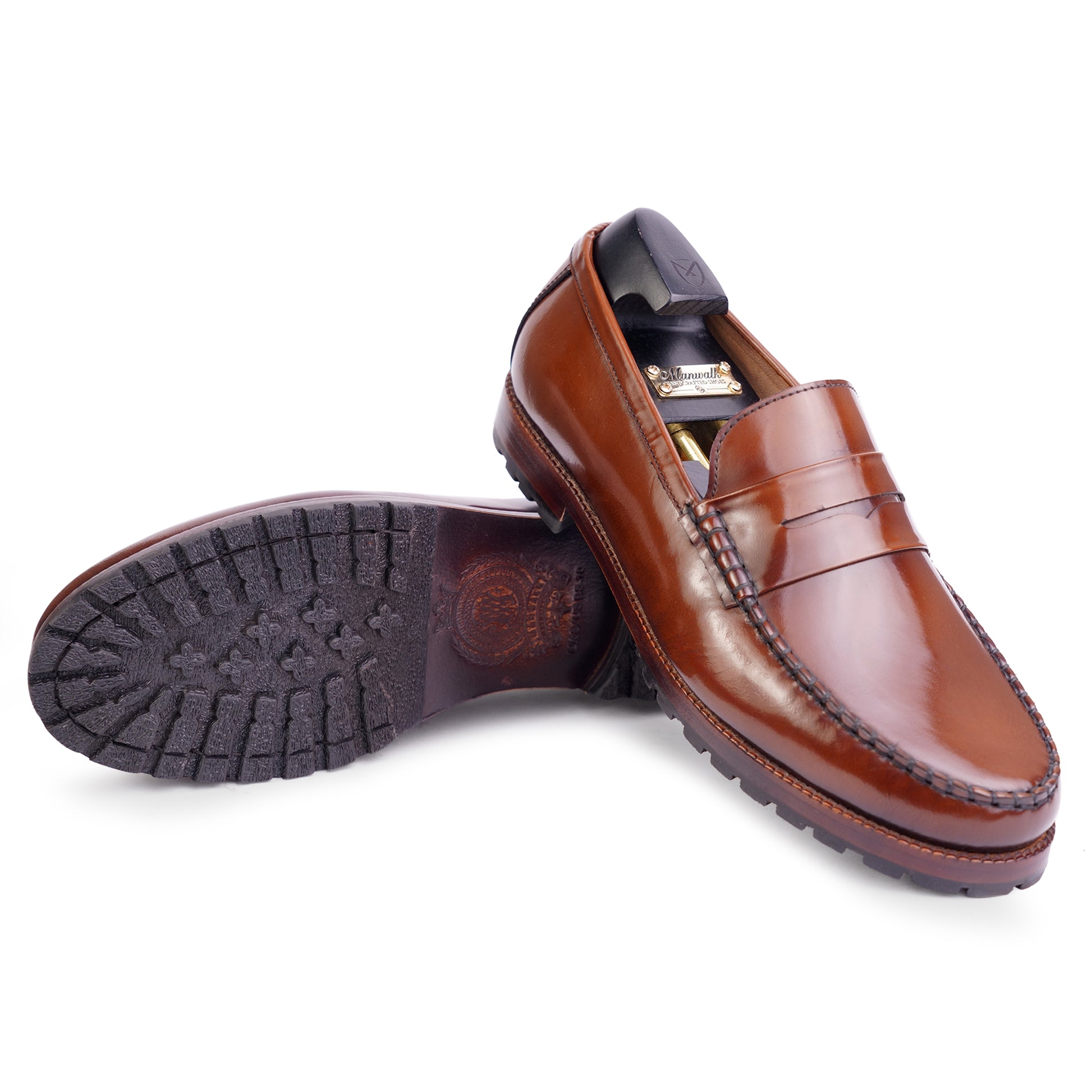 Outsole view of Brown colour Round toe Penny loafer formal shoes in leather with Blake stitched leather sole
